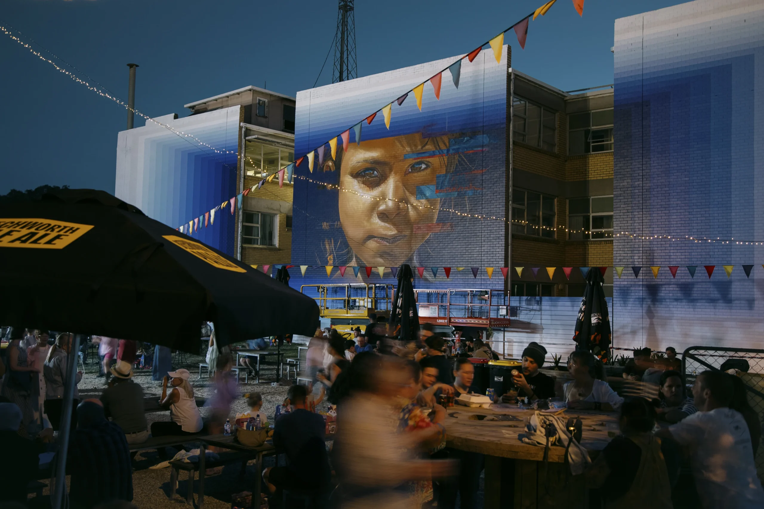 The Hub Benalla Street Art Festival 2025 buzzing with activity as Adnate and DREZ collaborate on an epic artwork